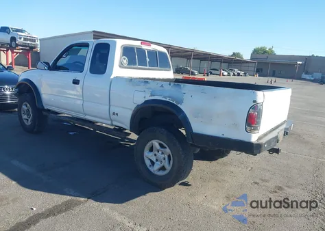 1999 Toyota Tacoma из США, поврежденный, VIN 4TAWN72N4XZ557069